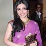 Soha Ali Khan in one side parting hairstyle with pink saree