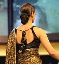 Aishwarya Rai in saree with classic bun hairstyle